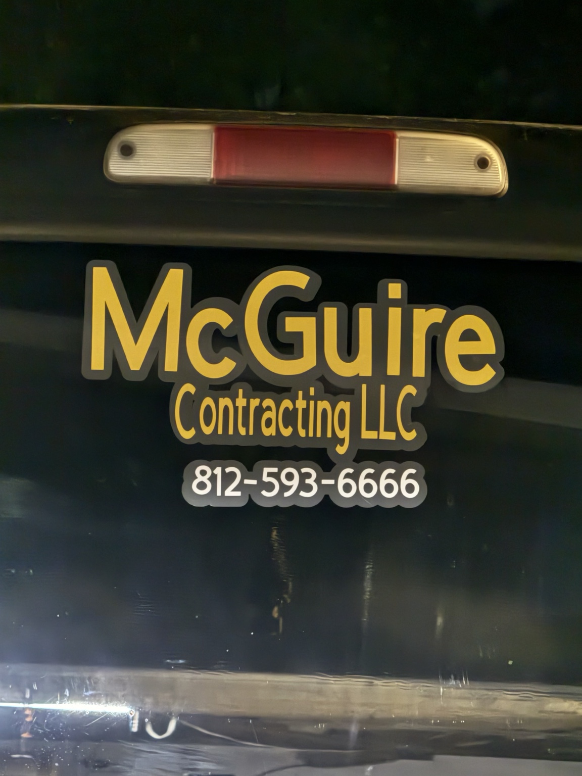 McGuire Contracting company truck branding